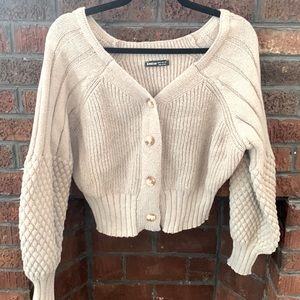 Gray button up sweater size medium. Never worn.